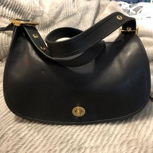 Vintage black legacy crescent saddle shoulder bag